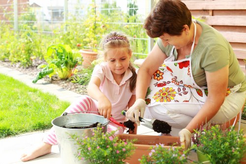 Gardener inspecting a garden bed for a complaint review